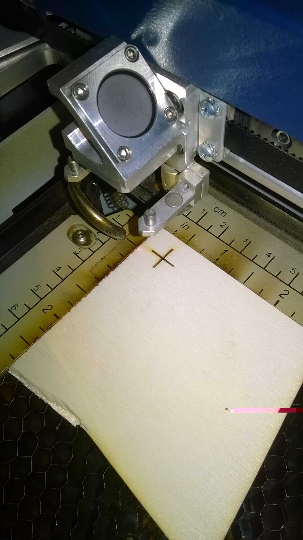 Position von rotem Laserpunkt